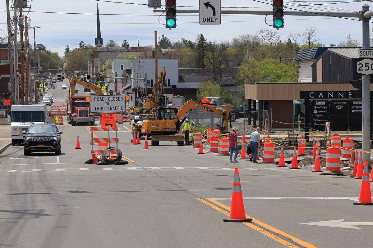 Construction underway on a main street as part of a roadway improvement project.